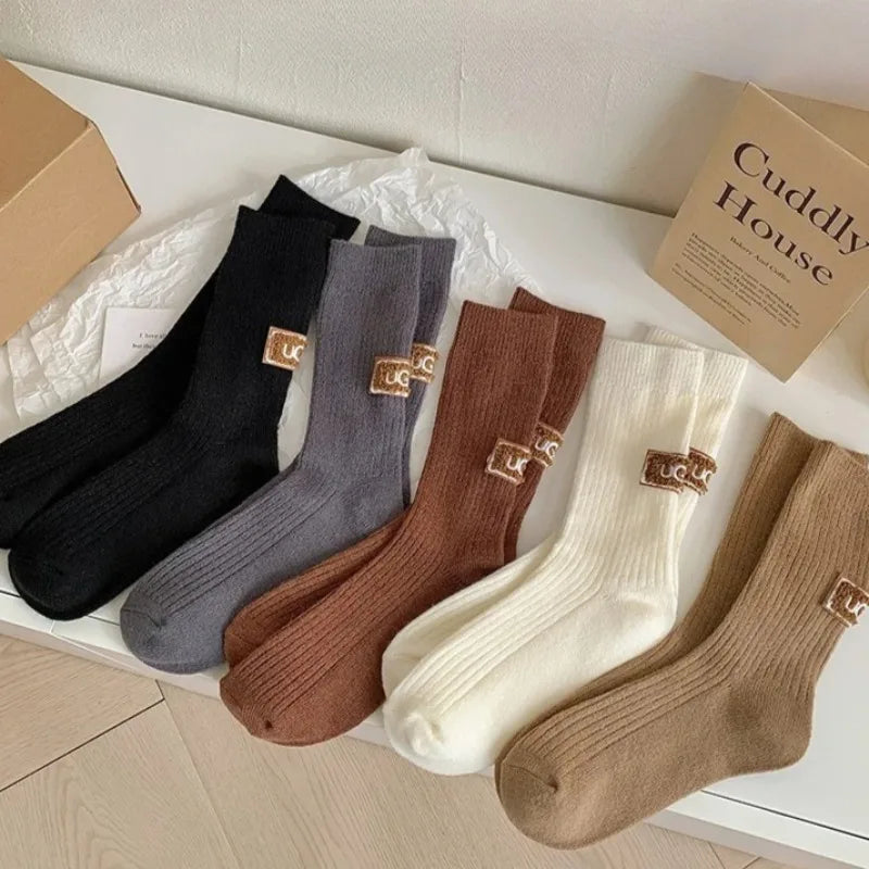1/3 pares de calcetines de invierno gruesos y cálidos, de color liso, a media pantorrilla, casuales para mujer con logotipo bordado, calcetines de pila para climas fríos