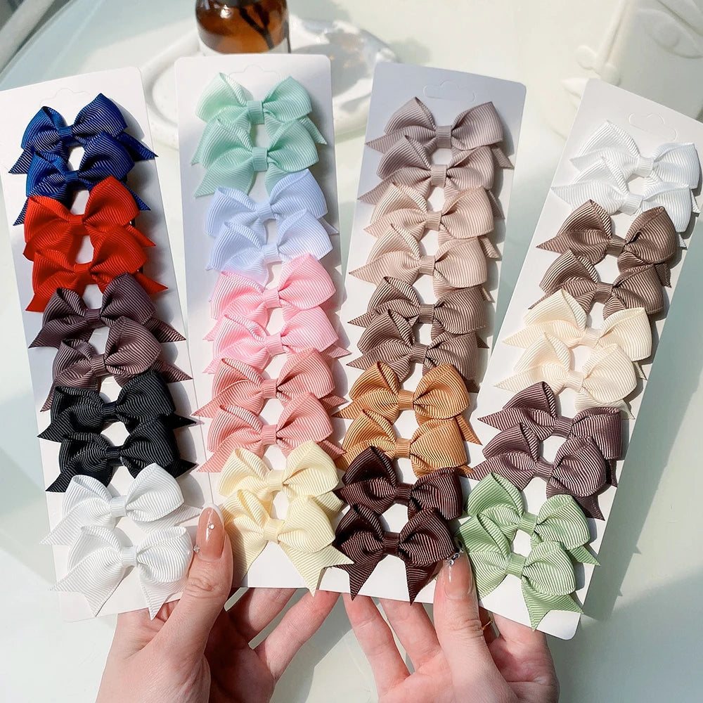 10 Stück/Set einfarbige Kinderhaarschleifen Haarklammern für Baby Mädchen handgefertigte Bandschleifen Haarnadeln Haarspangen Neujahr Haaraccessoires