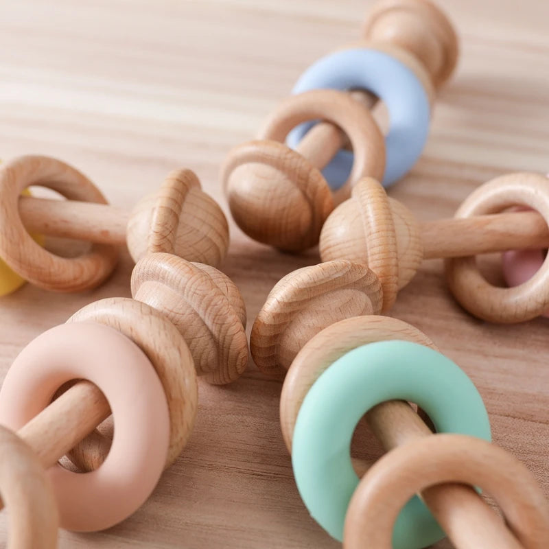 BPA-free Baby Toys Wooden Rattles Silicone Ring Rattles and Mobiles Babies 0–12 Months Sensory Toys Wooden Teether Baby Gifts