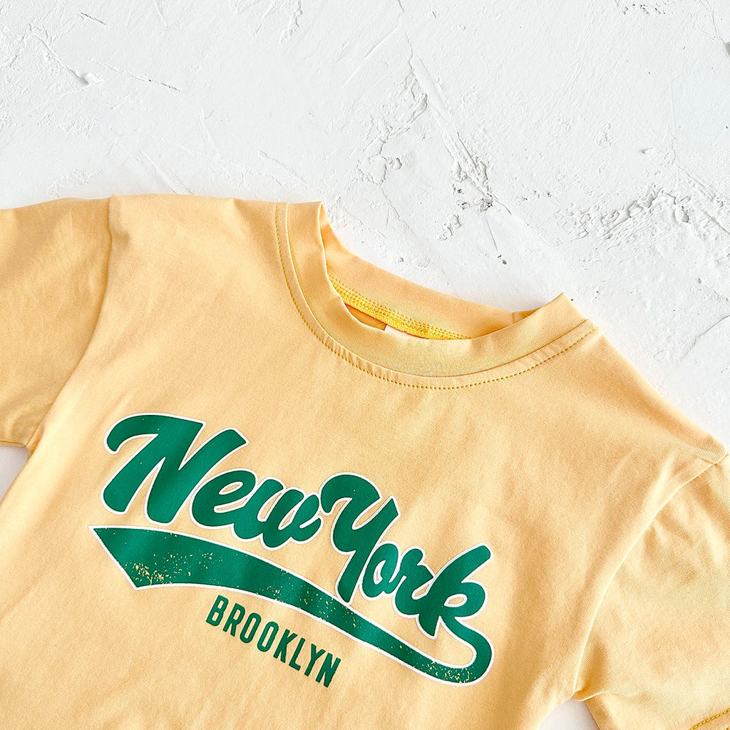 Neugeborene Babykleidung Set für Jungen und Mädchen, lässig, 2-teilig, mit Buchstaben bedrucktes Kurzarm-T-Shirt + karierte Shorts, Baby-Outfit 0-3 Jahre