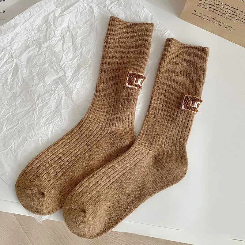 1/3 pares de calcetines de invierno gruesos y cálidos, de color liso, a media pantorrilla, casuales para mujer con logotipo bordado, calcetines de pila para climas fríos