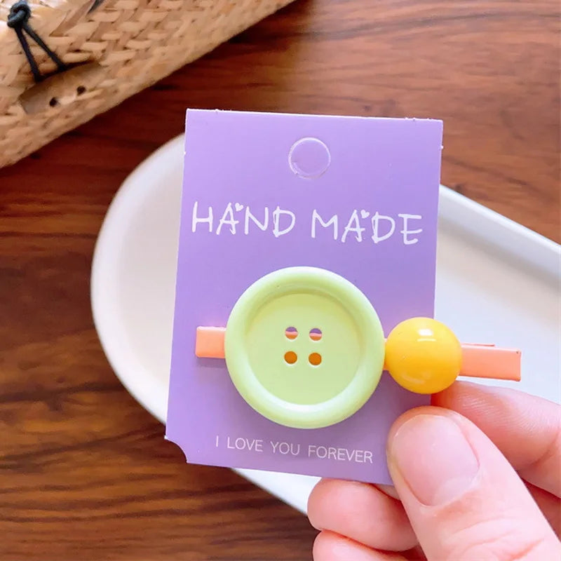 2023 Neues Baby Mädchen Süße Knopf-Haarnadel Pony-Spange Süßigkeitenfarbene Haarspangen Kinder-Haarspange Haarschmuck für Kinder
