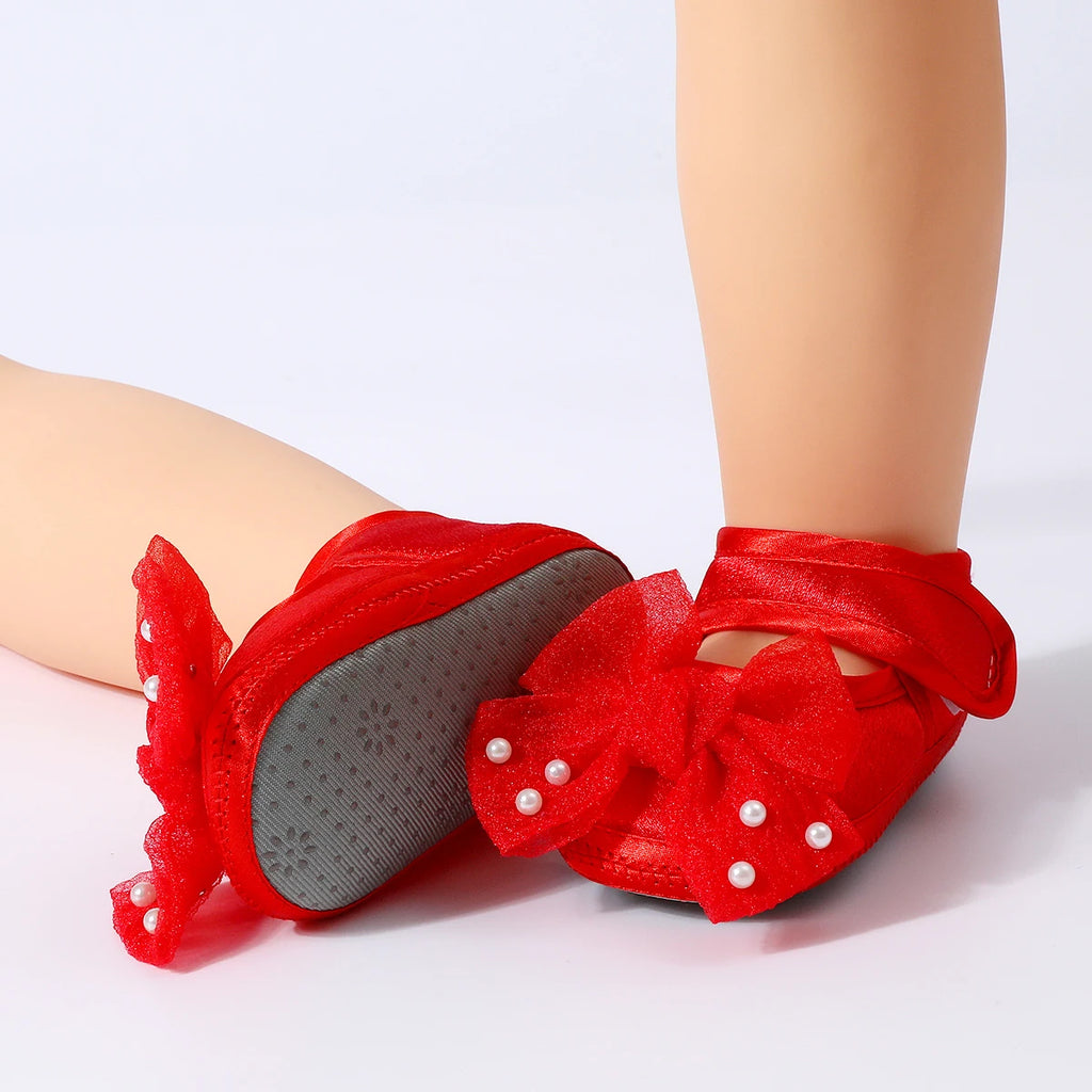 Baby non-slip learning walking shoes, cute bow design, soft flat shoes for infants, suitable for indoor parties and gatherings.