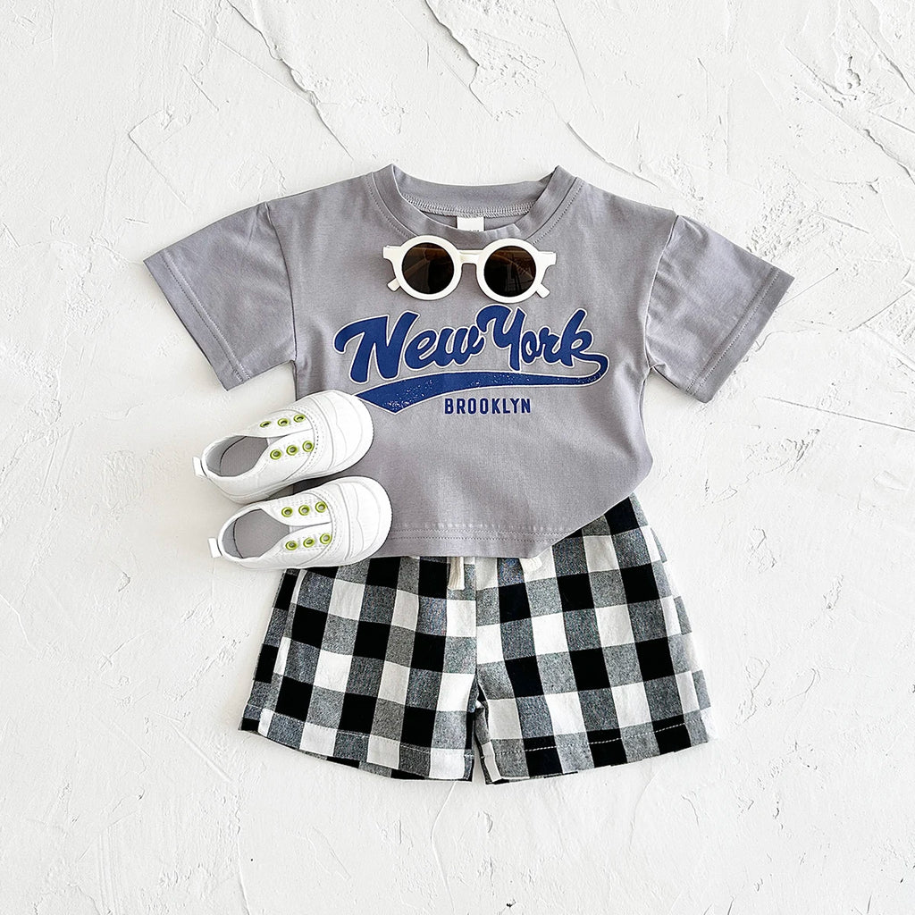 Neugeborene Babykleidung Set für Jungen und Mädchen, lässig, 2-teilig, mit Buchstaben bedrucktes Kurzarm-T-Shirt + karierte Shorts, Baby-Outfit 0-3 Jahre
