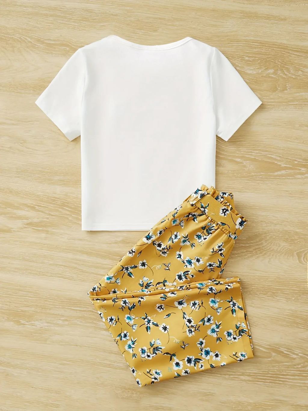 Conjunto de 2 piezas de verano para niña: camiseta con estampado de dibujos animados y pantalones rectos florales, ropa infantil transpirable, atuendo informal de moda.