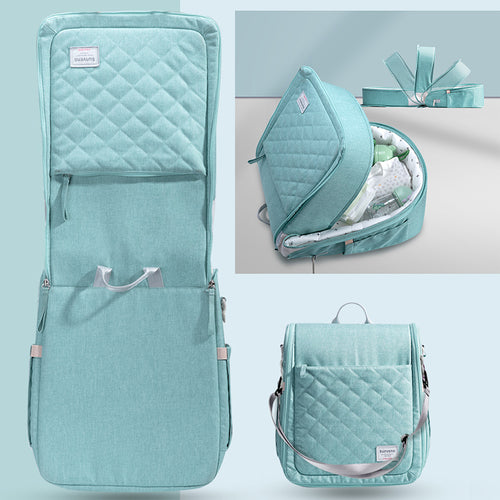 Tragbarer Wickelrucksack mit Wickelunterlage